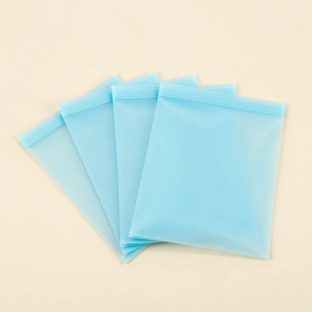 A family pack of four silicone storage bags on a light background